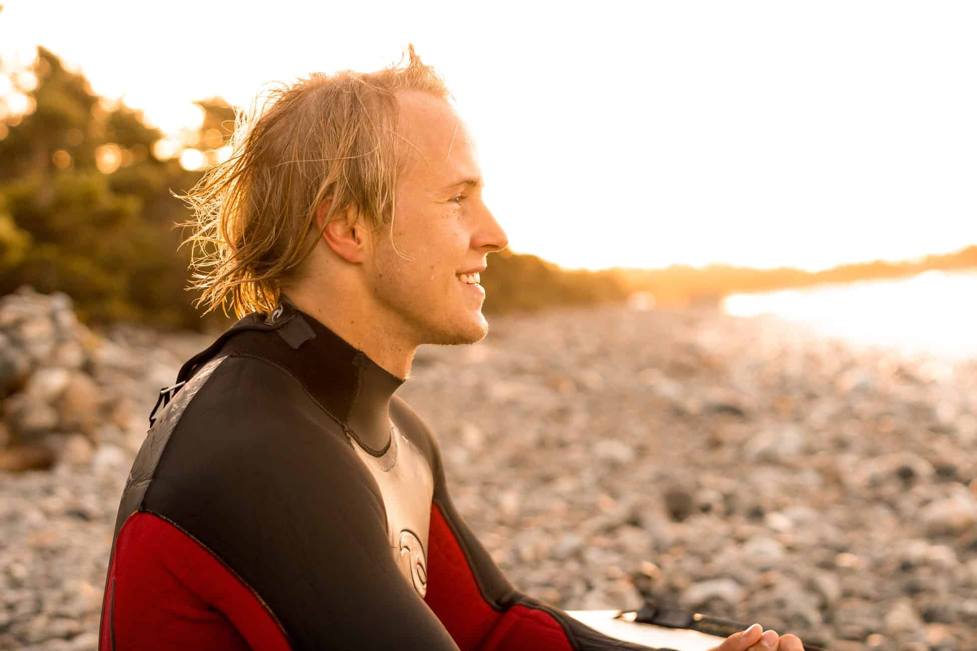 9. "Longish Blonde Hair Male Surfer" by Canva - wide 2
